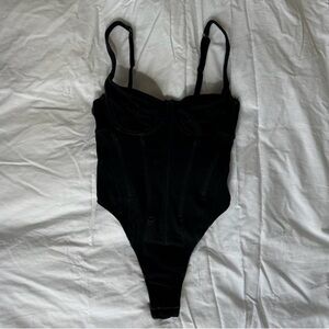 SKIMS BUSTIER BODYSUIT.
